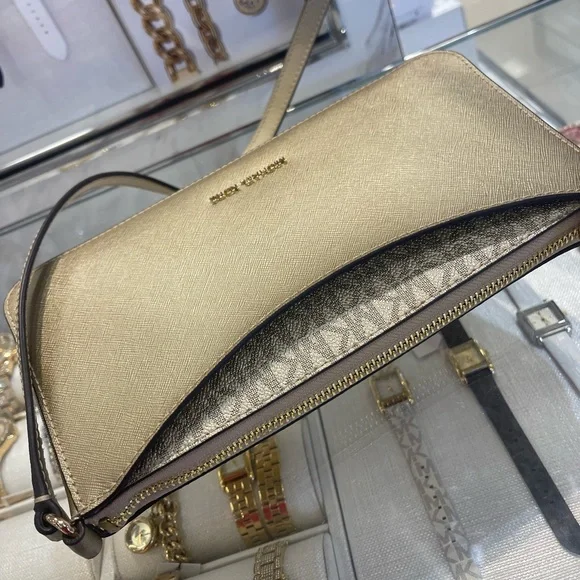 MICHAEL KORS Arden Medium Metallic Crossbody Bag
Pale Gold 
NWT - Picture 13 of 16
